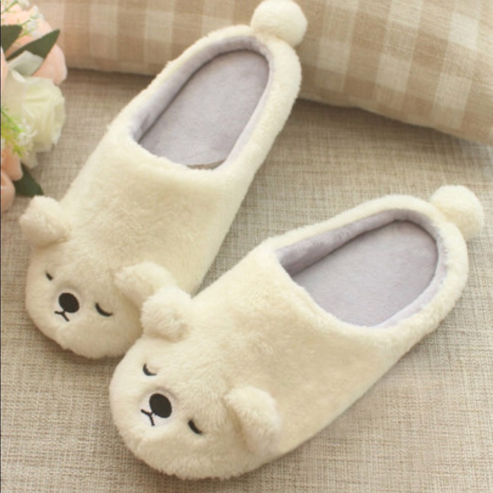 Adorable sleeping fuzzy bear slippers